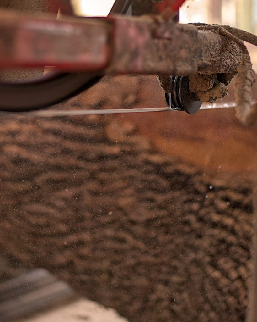 Bob’s Big Boards backyard sawmill in Longview, Washington, producing custom lumber and handcrafted wood slabs with local timber, artisanal milling equipment, and Pacific Northwest craftsmanship in a rural workshop setting.