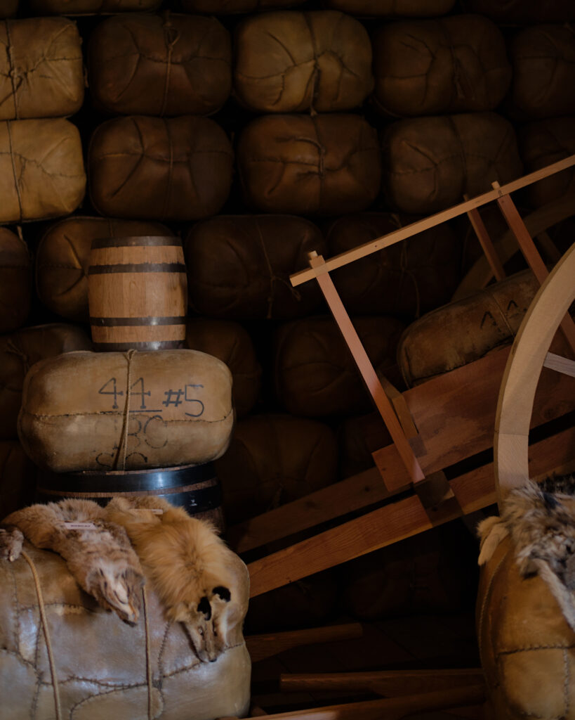 Historical reenactors in period costumes at Fort Vancouver National Historic Site in Vancouver, Washington, depicting 19th century fur trade era with restored buildings, museum displays, and living history exhibits.