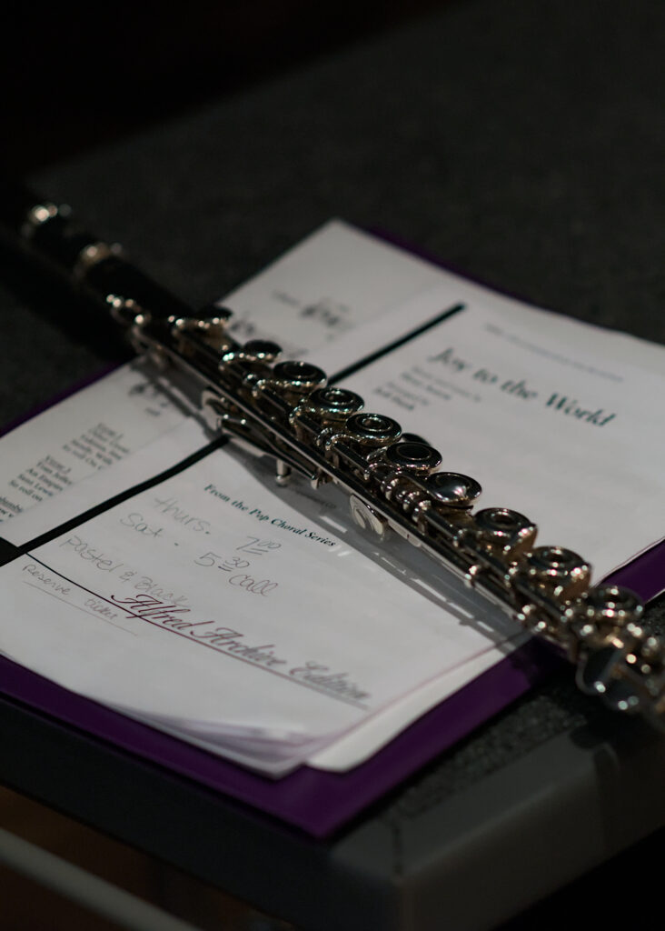 LaRhonda Steele performing live soul, blues, and jazz music on stage at the historic Columbia Theatre in Longview, Washington, during the venue’s centennial celebration with band and community choir.