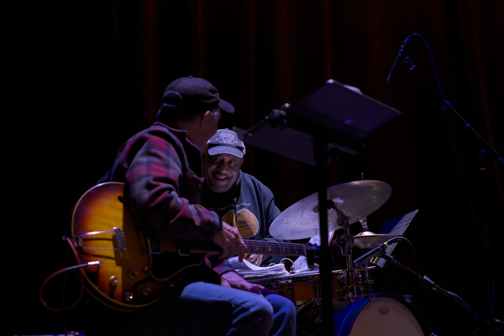 LaRhonda Steele performing live soul, blues, and jazz music on stage at the historic Columbia Theatre in Longview, Washington, during the venue’s centennial celebration with band and community choir.