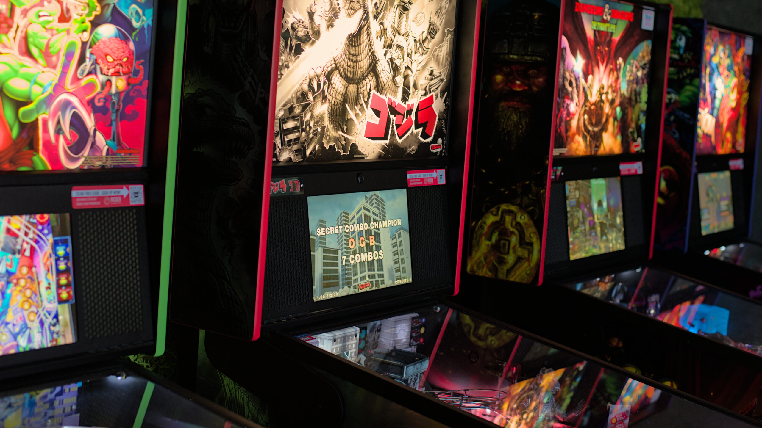 Candid photos inside the Thirsty Sasquatch and Hungry Sasquatch in Vancouver, Washington, showing pizza, craft beer, bar seating, and arcade games in a lively local restaurant and pub setting.