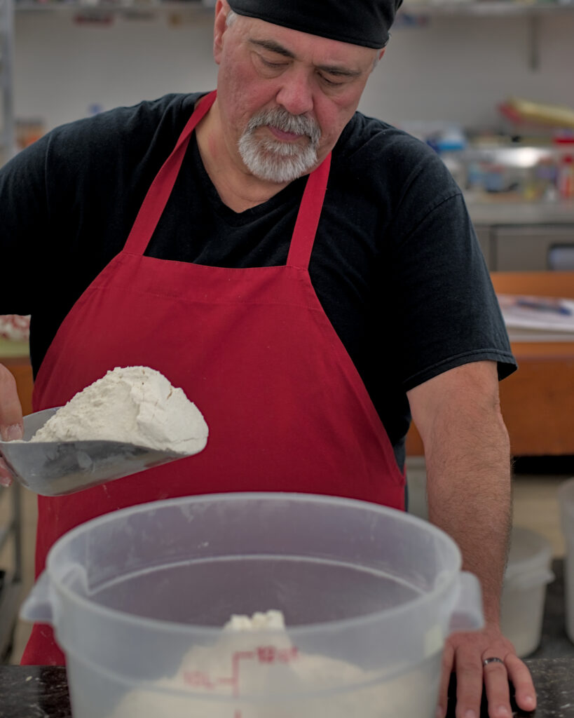 Artisan bakery in Kalama, Washington, featuring freshly baked sourdough bread, wheat loaves, buns, and pizza dough made with a local starter and baked in a traditional oven in the Lower Columbia region.